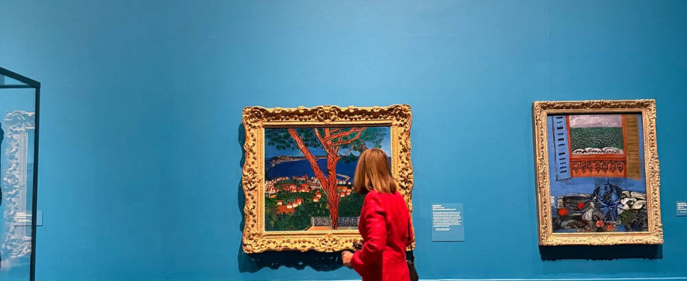 Painting the French Riviera lady wearing red